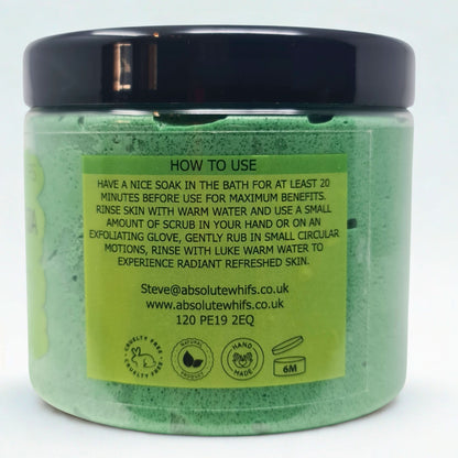 Pear and freesia sugar body scrub in green jar with black lid showing usage instructions and natural ingredients icons