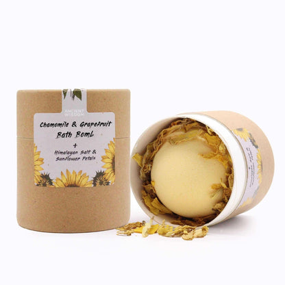 Sunflower Serenity bath collection with chamomile grapefruit bath bomb, Himalayan salt, and sunflower petals in eco-friendly packaging