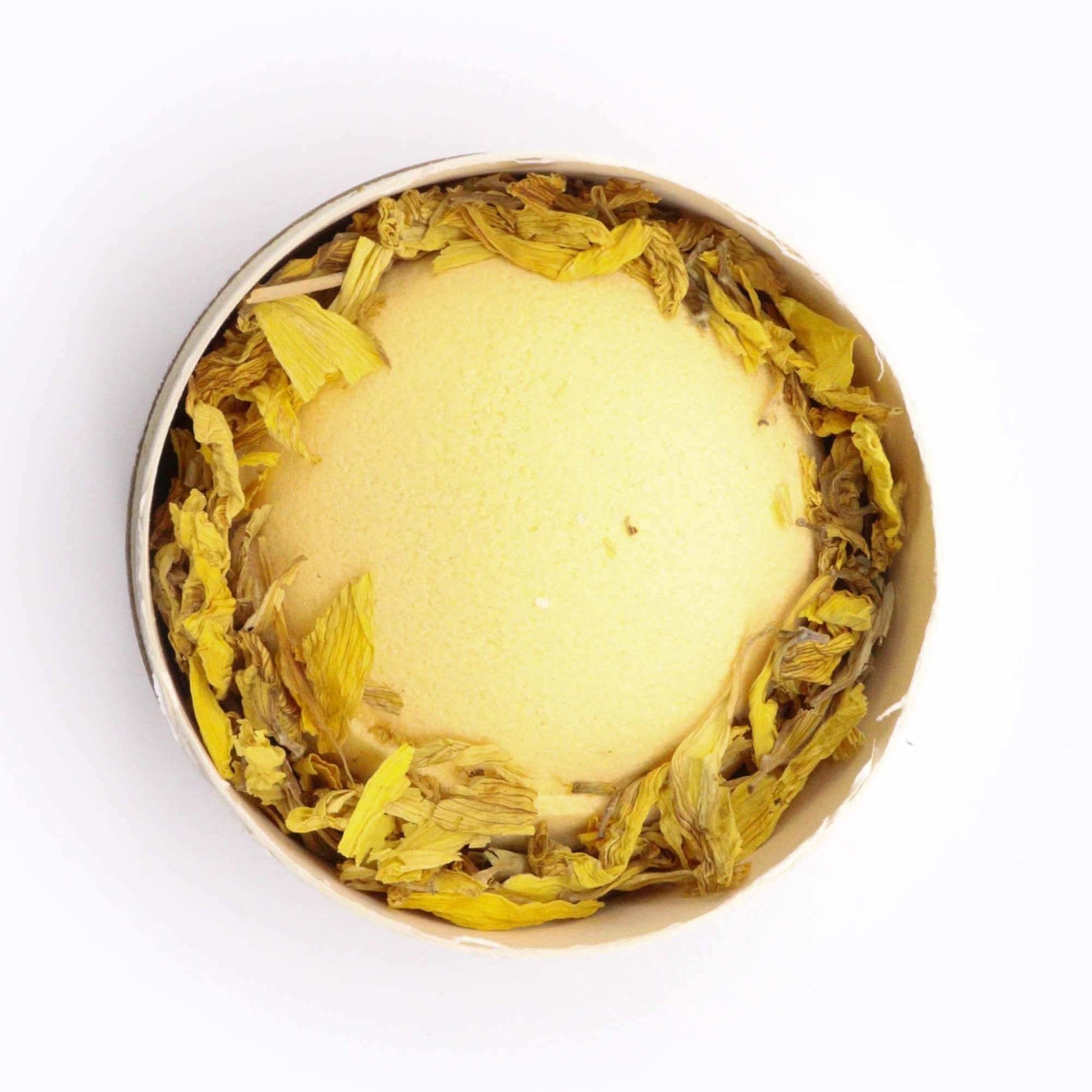 Sunflower Serenity bath bomb with dried sunflower petals in eco-friendly packaging