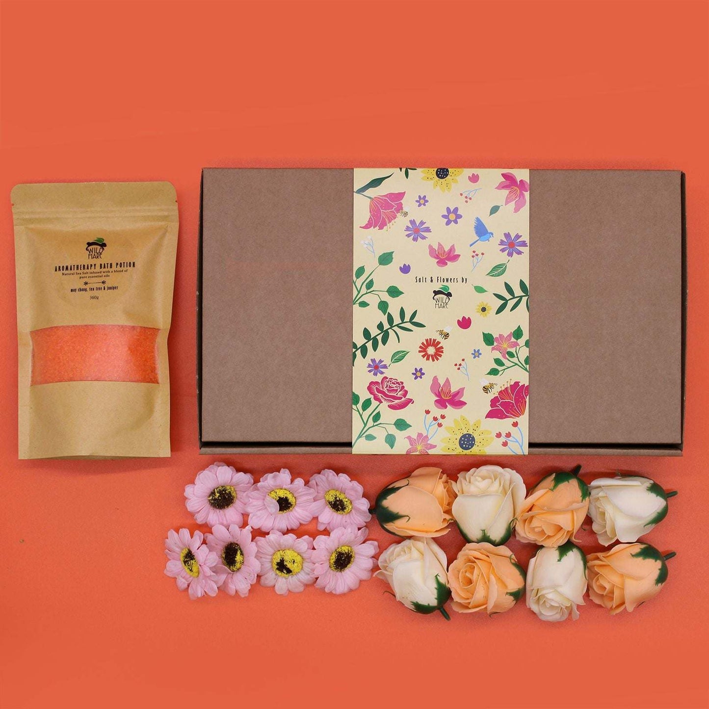 Salt soak set with natural salts, essential oils, flower petals, and elegant gift packaging for detox and relaxation bath rituals