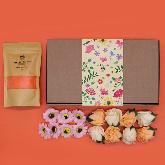 Salt soak set with natural salts, essential oils, flower petals, and elegant gift packaging for detox and relaxation bath rituals
