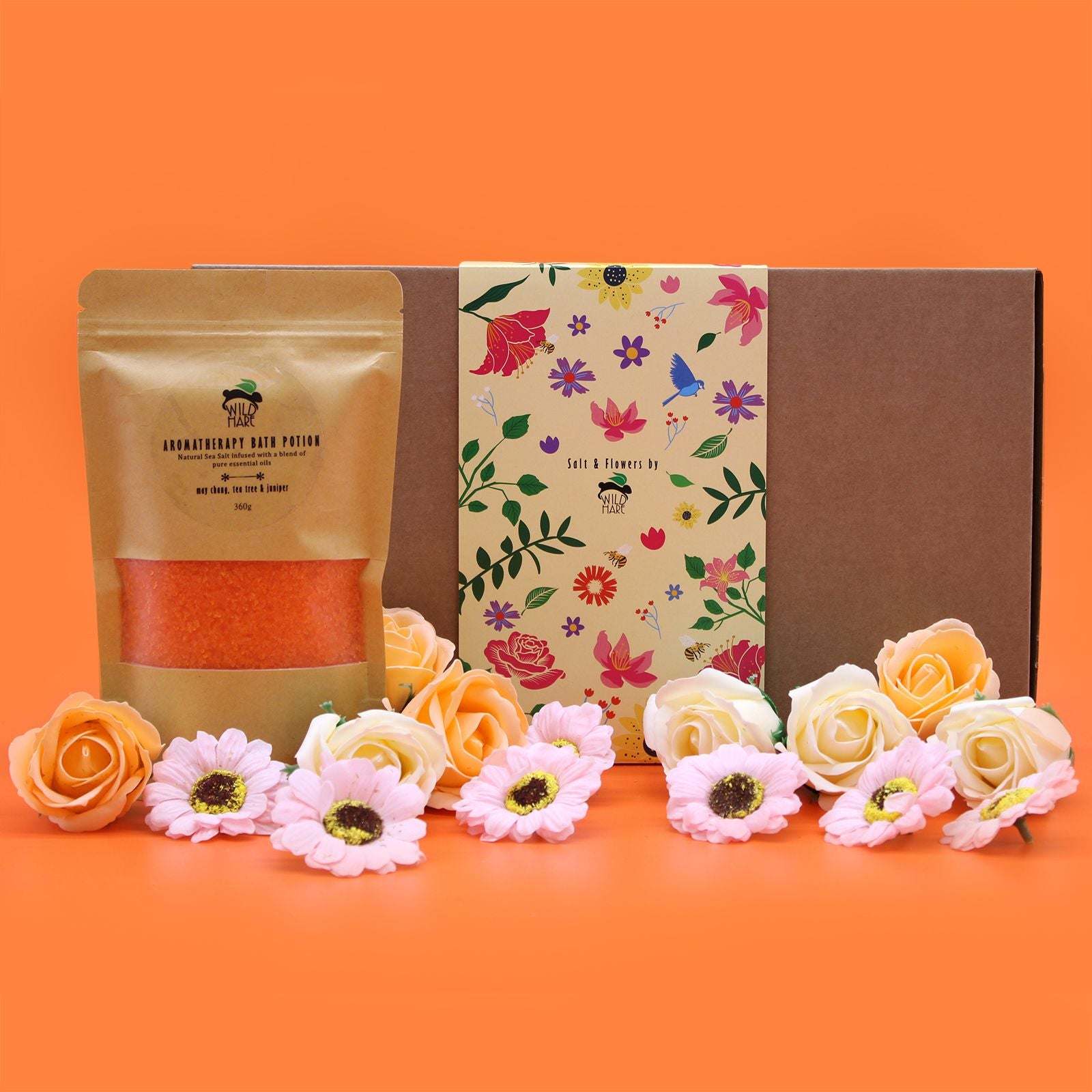 Salt Soak Set with natural salts, essential oils, flower petals, and elegant gift packaging for detox and relaxation bath experience