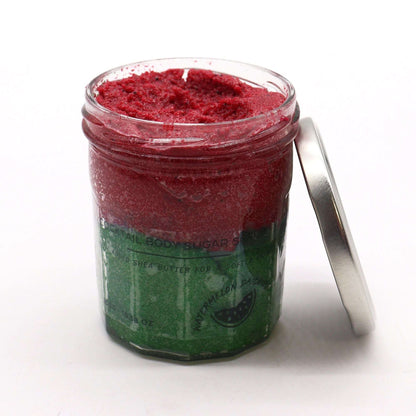Fragranced sugar body scrub in watermelon daquiri scent with red and green layers in a 300g jar