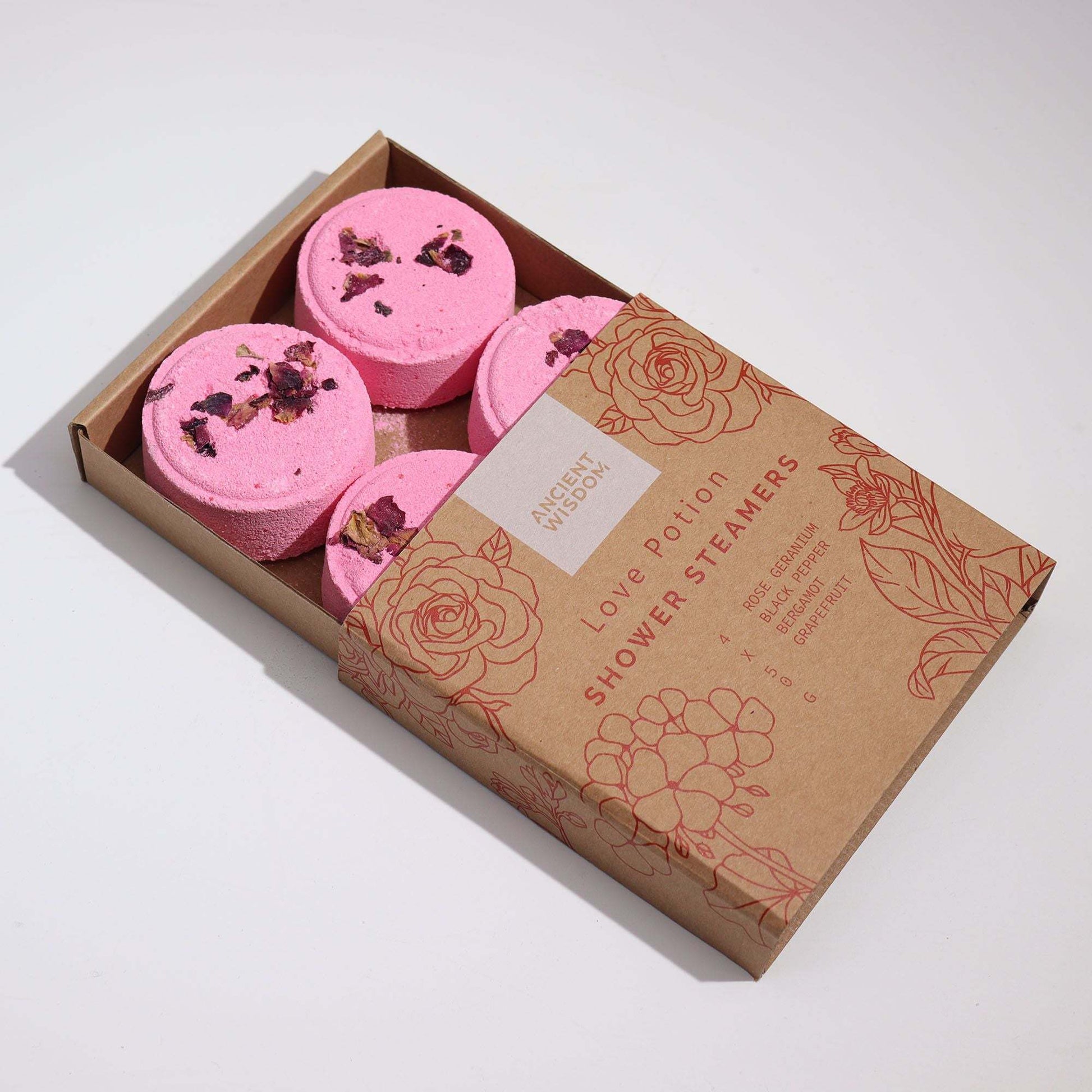 Zen Shower Steamers Love Potion gift set with pink essential oil steamers and rose petals in cardboard box