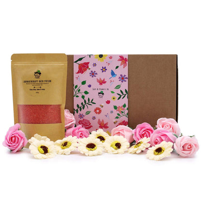 Salt soak set with natural aromatic bath salts and floral petals in elegant packaging