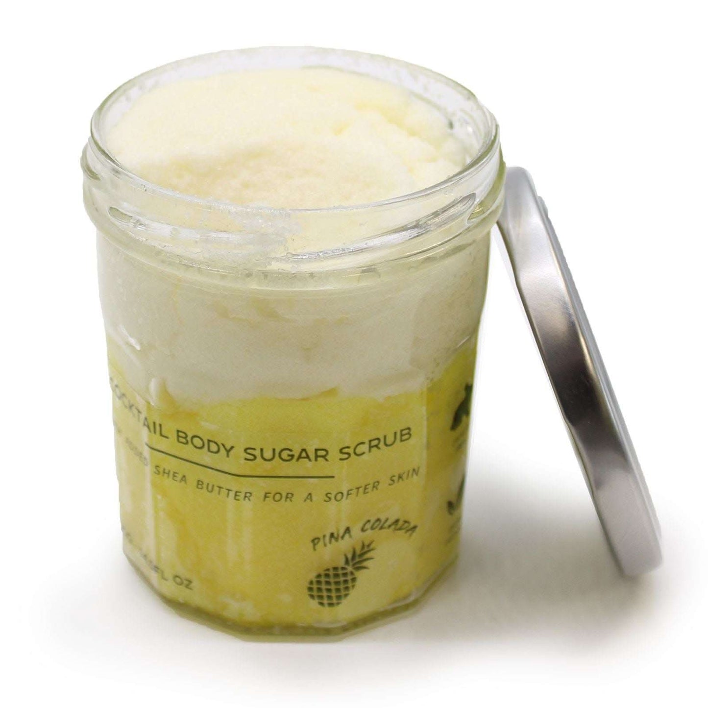 Fragranced sugar body scrub in a jar with pina colada scent and shea butter for soft skin