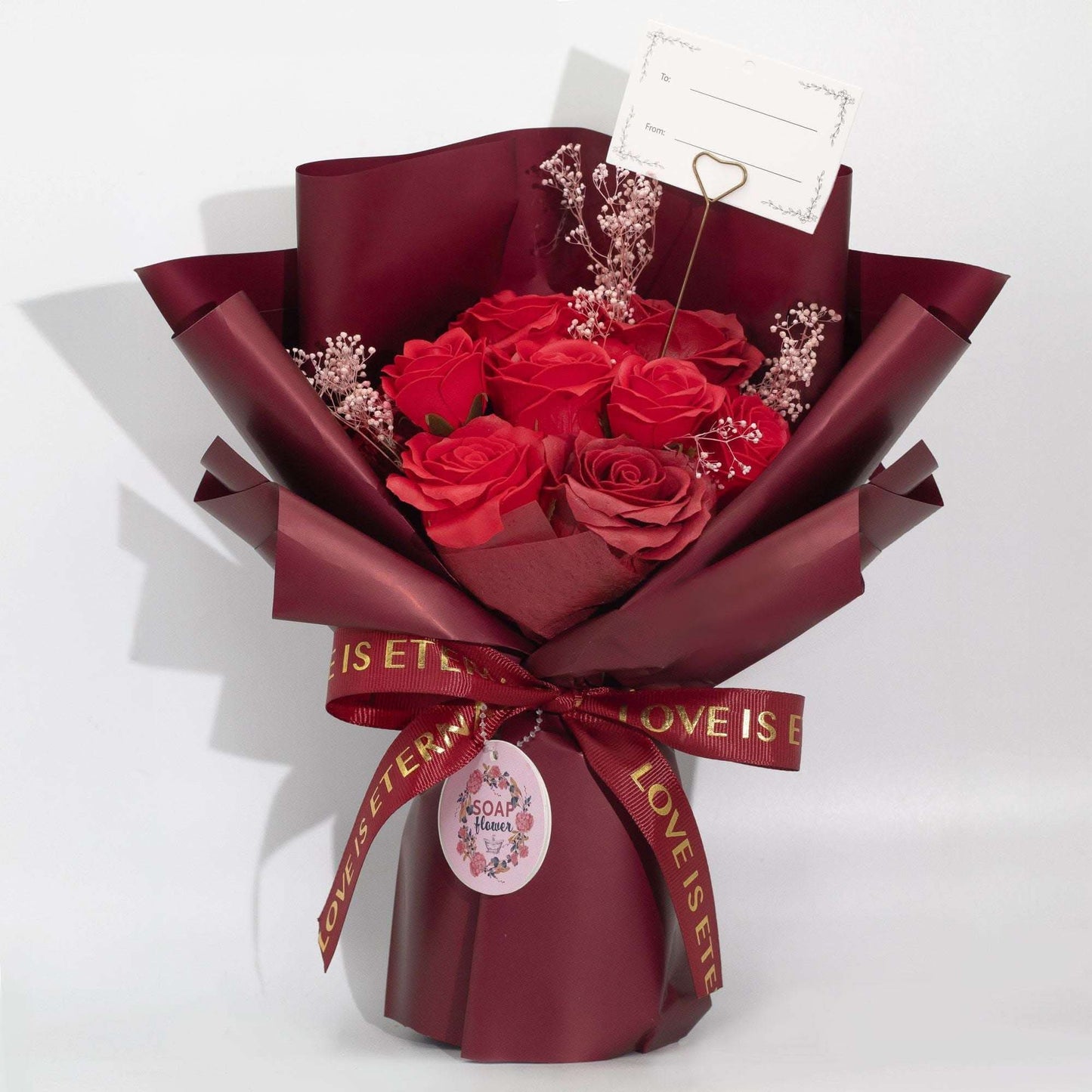 Large red soap roses bouquet wrapped in wine paper with Love is Eternal ribbon and gift card