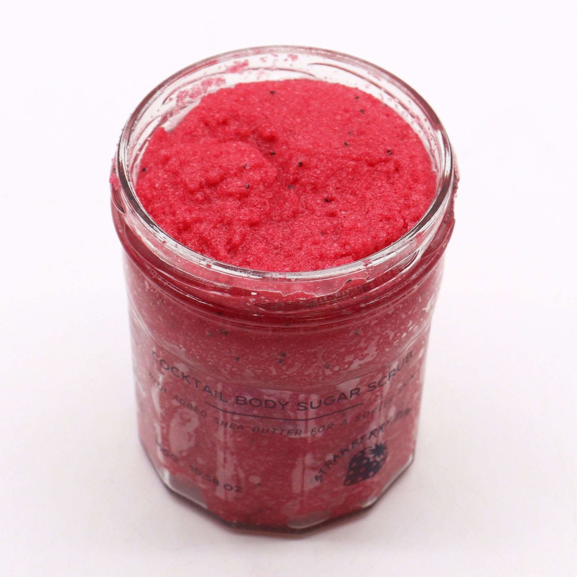 Fragranced Strawberry Rum sugar body scrub in a clear jar, 300g