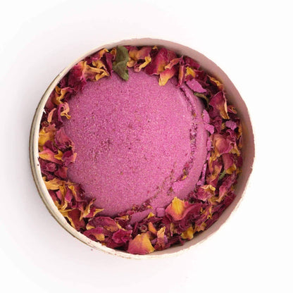 Cupid's Self Care aromatherapy bath bomb with rose petals in eco-friendly packaging