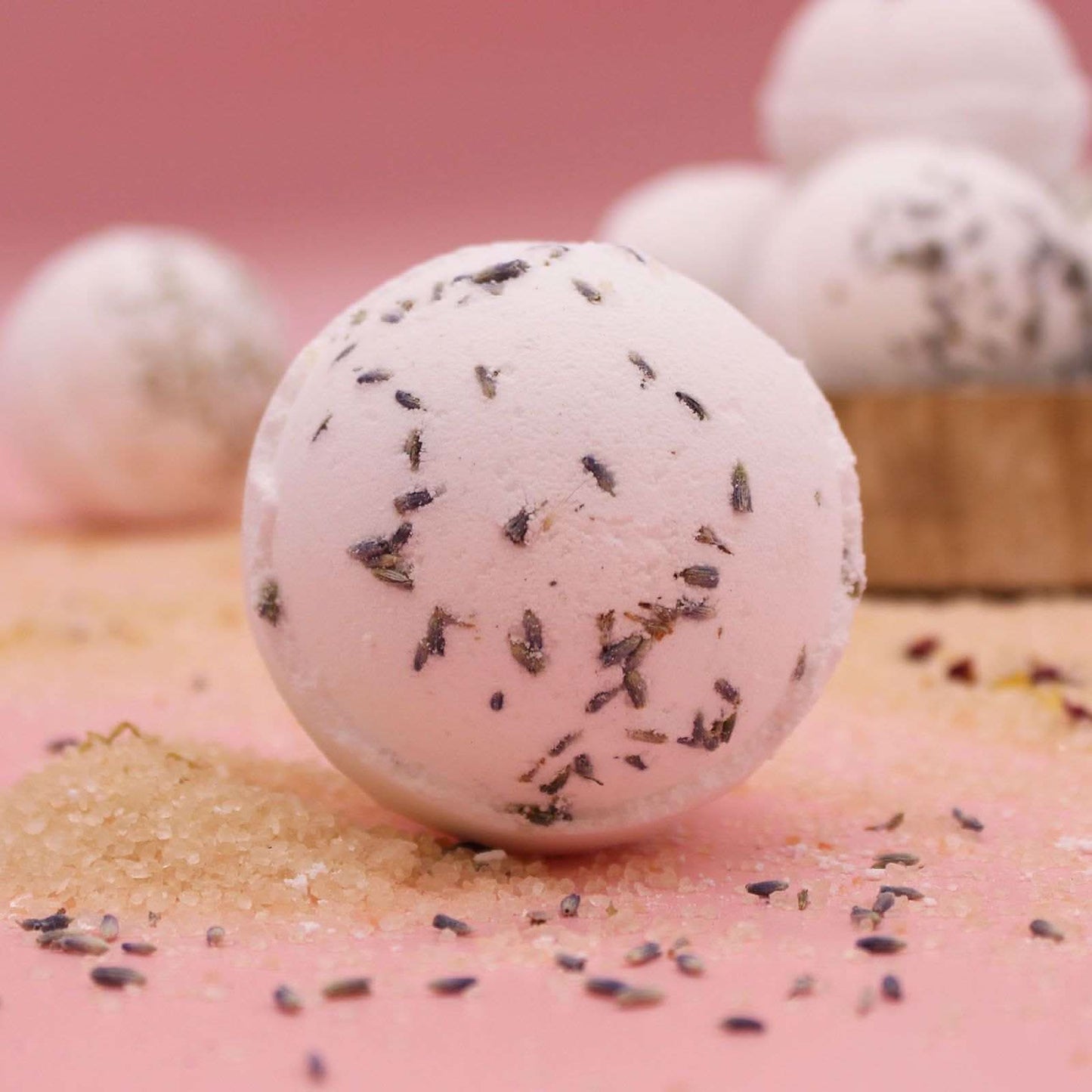Relax - Himalayan Salt Bath Bomb with lavender and jojoba oil on pink background