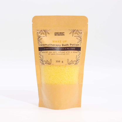 Aromatherapy Bath Potion Wake Up in kraft bag with grapefruit, peppermint, and May Chang essential oils, 350g sea salt blend.