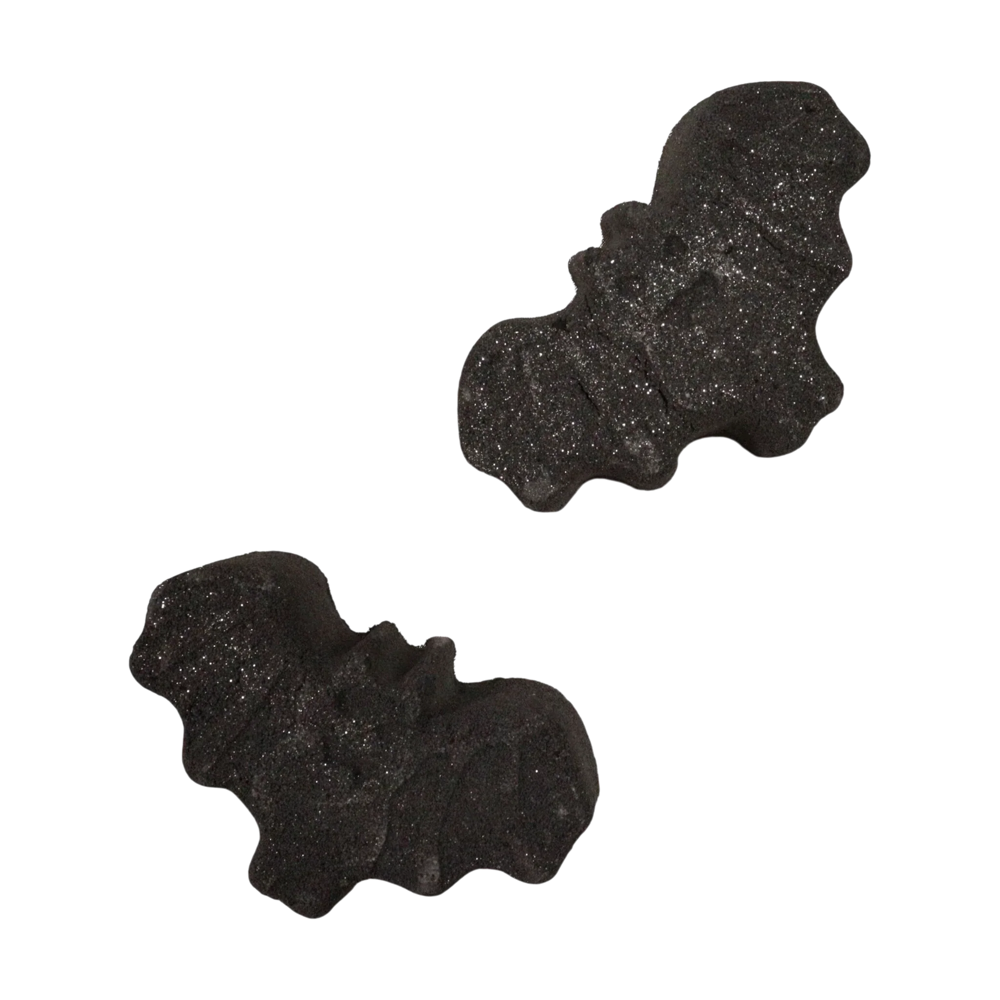 Bat Halloween bath bomb releasing dark colors in water