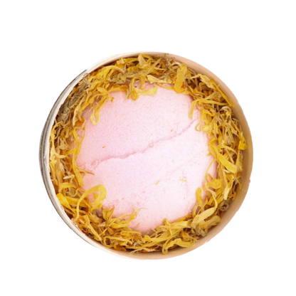 Blooming Pink Bliss Aromatherapy Bath Collection with pink bath bomb and yellow marigold petals