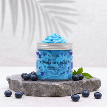 Blueberry Whipped Soap in a clear jar with bright blue whipped texture, blueberry pattern and fresh blueberries