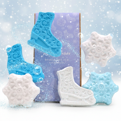 Break the Ice Christmas Bath Bomb Gift Pack featuring blue ice skate and white and blue snowflake shaped bath bombs with textured patterns