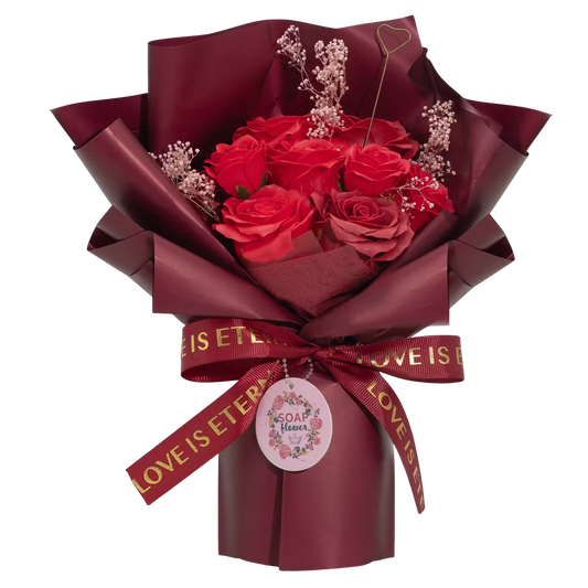 Large red roses bouquet with wine-hued wrapping and "Love is Eternal" ribbon, including gift card and gold heart holder