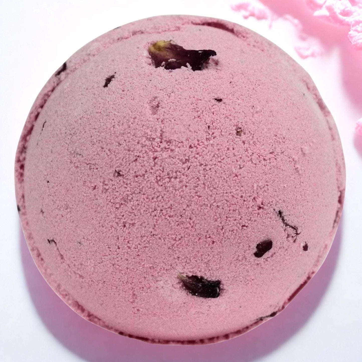 Pink Rose & Petals Bath Bomb with visible dried rose petals for luxury bath care