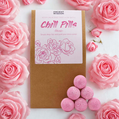 Chill Pills Gift Pack 350g Rose fragranced bath bombs surrounded by pink roses