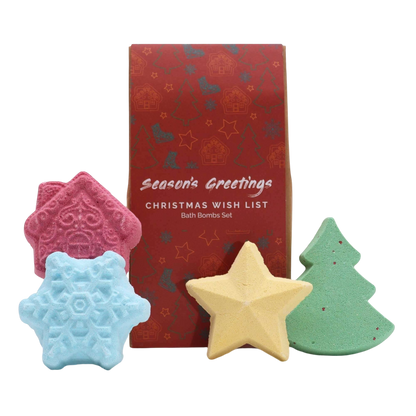 Christmas Bath Bomb Gift Pack featuring a red house, blue snowflake, yellow star, and green Christmas tree shaped bath bombs with seasonal packaging