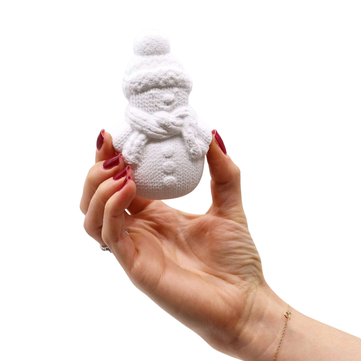 Christmas Fun Bath Bomb Gift Pack white snowman shaped bath bomb held by hand with red manicure