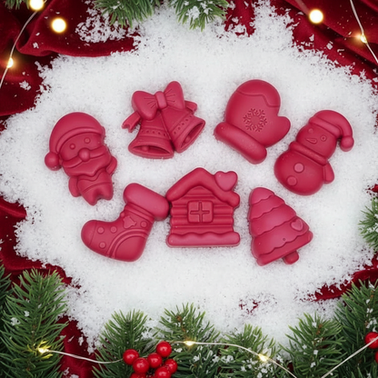 Christmas themed scented wax melts with Santa, snowman, and tree designs