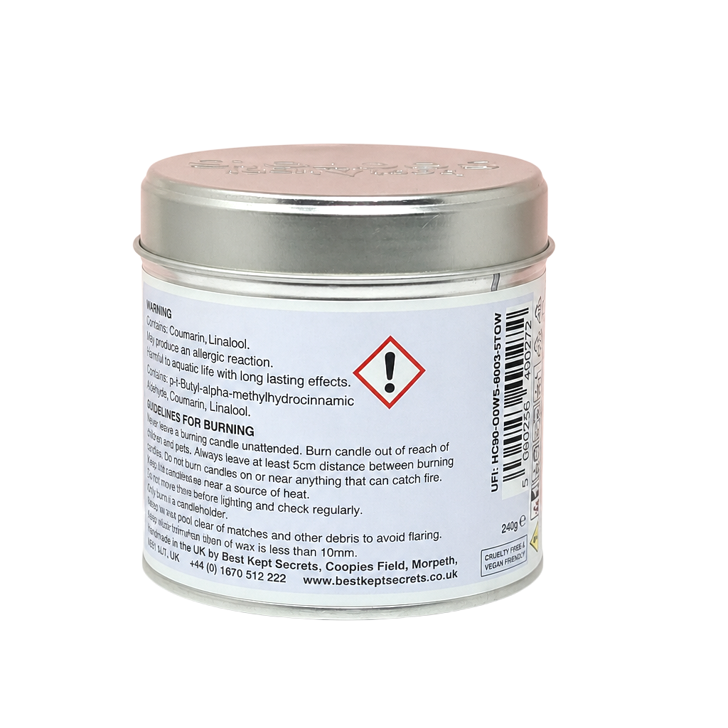 Classic Cotton Seriously Scented Candle in a small round silver metal tin with hazard and warning labels on the back