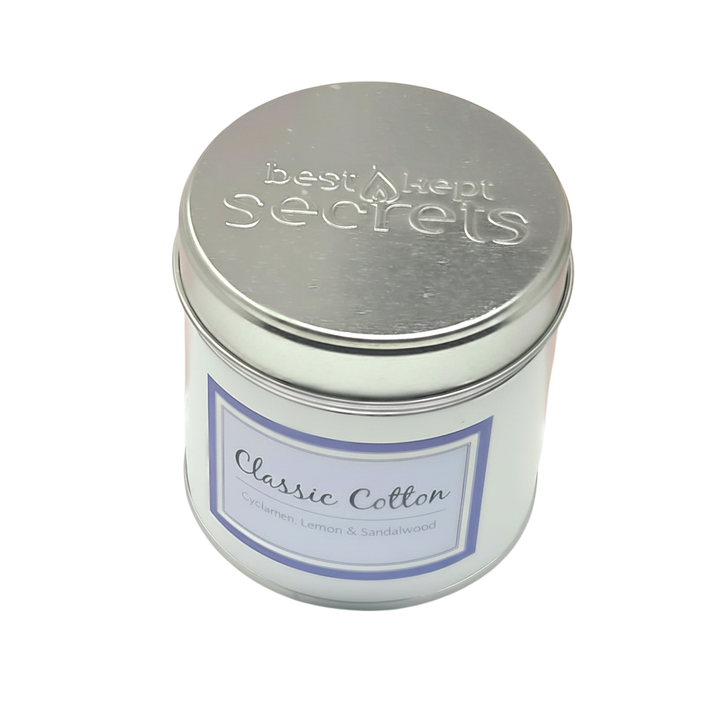 Classic Cotton Seriously Scented Candle in a white metal tin with silver lid, labeled with subtle blue and grey text
