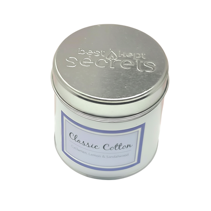 Classic Cotton Seriously Scented Candle in a white metal tin with silver lid, labeled with subtle blue and grey text