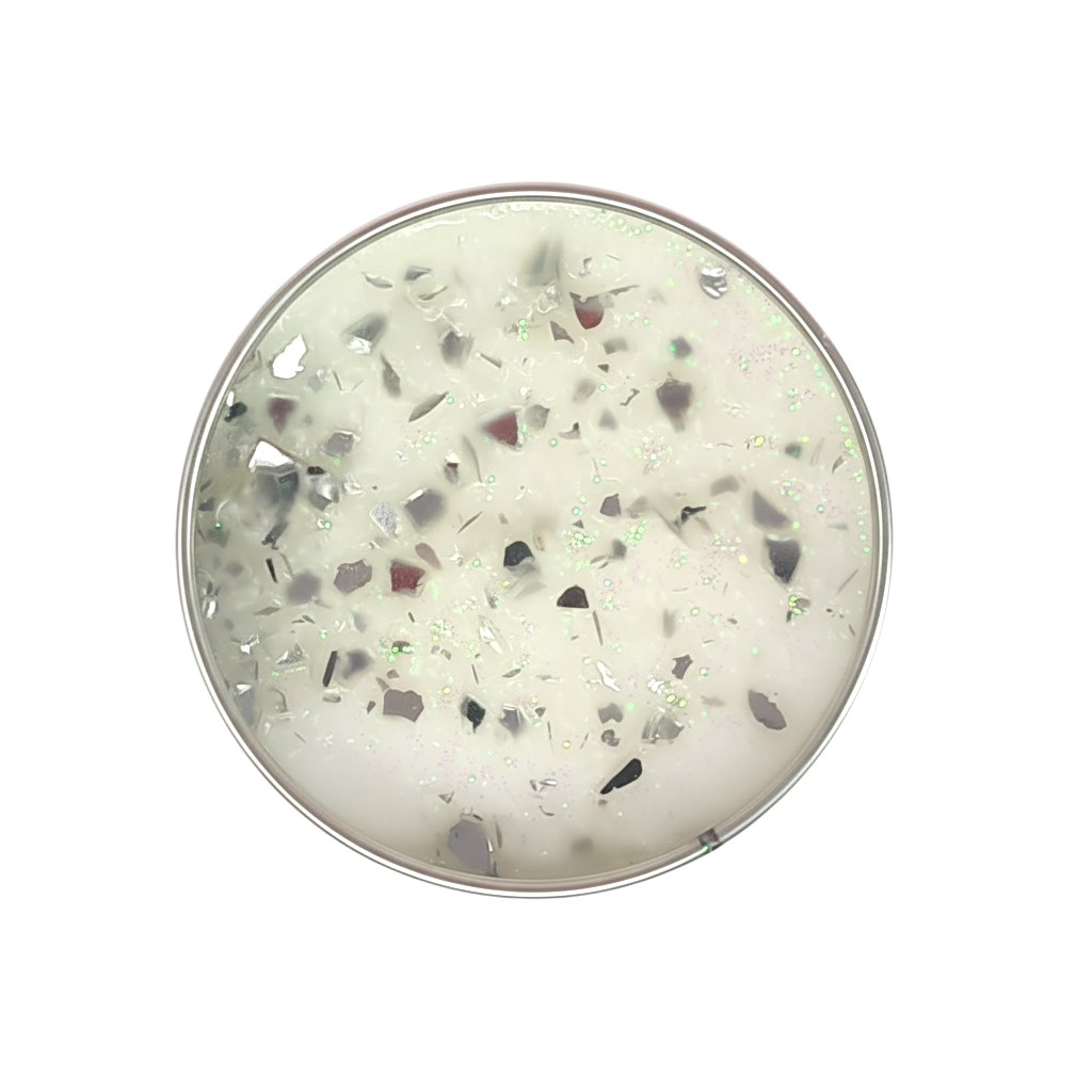 Classic Cotton Seriously Scented Candle with white wax and iridescent glittery and silver flake toppings in a round container