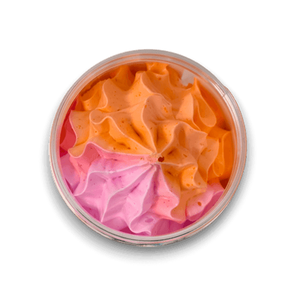 Coastal Blossoms Whipped Soap with swirled orange and pink fluffy whipped texture in a round container