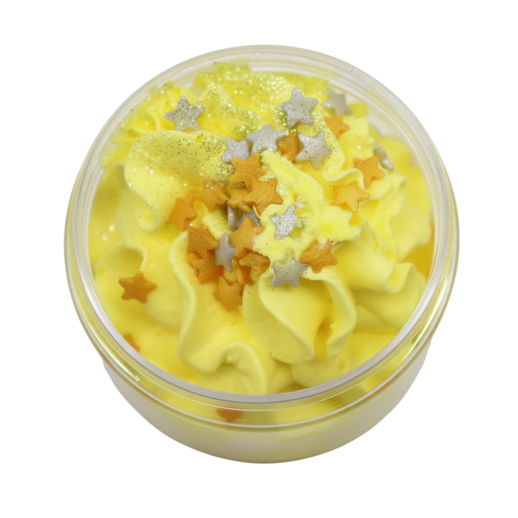 Cosy Winter Nights Whipped Soap in a clear jar, yellow whipped texture with silver and gold star sprinkles