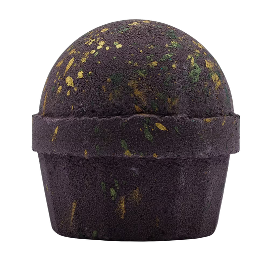 Dubai Bath Bomb shaped like a dark purple bath truffle, speckled with gold and green flecks and a domed top