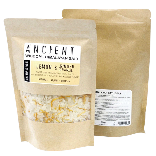Himalayan bath salt blend with lemon, ginger, orange essential oils, avocado oil, and marigold flowers in resealable kraft packaging.