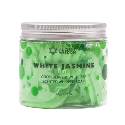 Jar of 'White Jasmine' scented whipped soap with green and white design on a white background