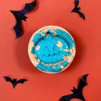 Handmade vegan fennel and orange Halloween bath bomb with vibrant colors