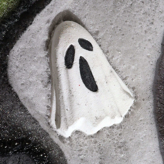 Ghost Halloween bath bomb fizzing in water