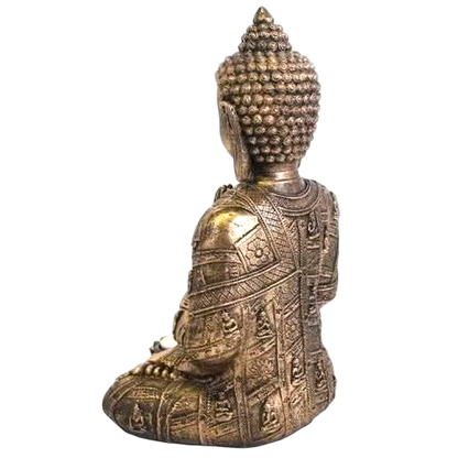 Large Buddha Tealight Holder with antique bronze finish and intricate engraved patterns on seated Buddha figure holding a tealight