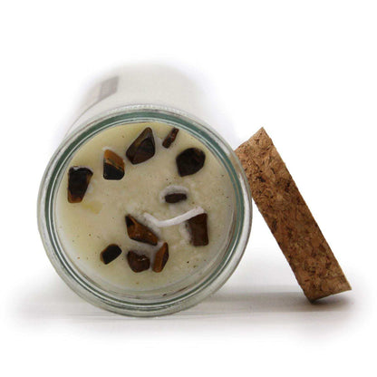 Magic spell confidence candle with tiger eye gemstone and cinnamon aroma
