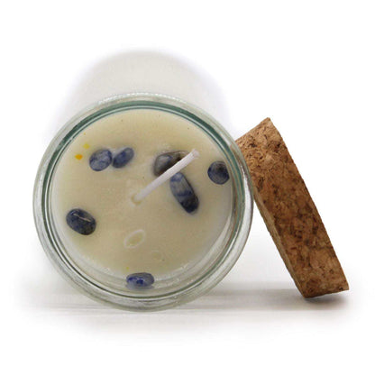 Magic Spell Candle for protection with sodalite gemstones and dragon blood scent
