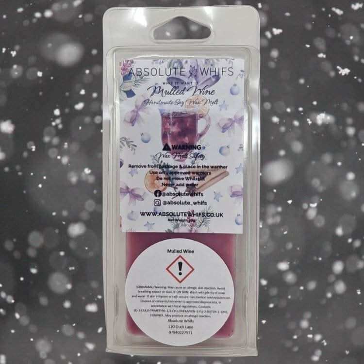 Mulled Wine Wax Melt Snap Bar in clear plastic clamshell packaging with festive winter label and safety warning