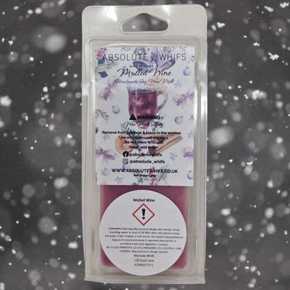Mulled Wine Wax Melt Snap Bar in clear plastic clamshell packaging with festive winter label and safety warning