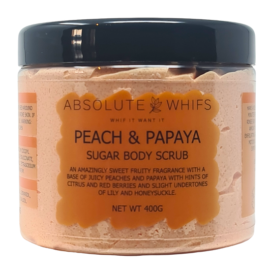 Peach and Papaya Sugar Body Scrub in clear jar with black lid, peach-colored whipped butter texture and orange label