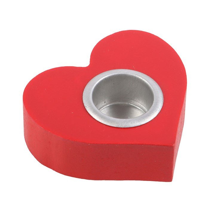 Red heart-shaped taper candle holder for romantic décor.