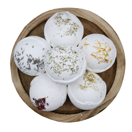 Relax Himalayan Salt Bath Bomb set of six white spherical bath bombs with herbal and floral accents in a wooden bowl