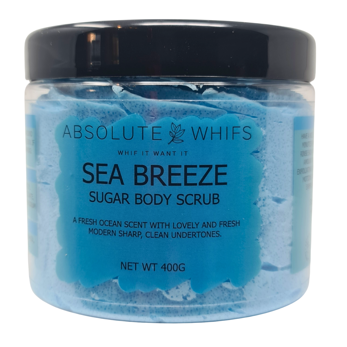 Sea Breeze Sugar Body Scrub in a clear jar with black lid, featuring blue sugar scrub and ocean-inspired scent label