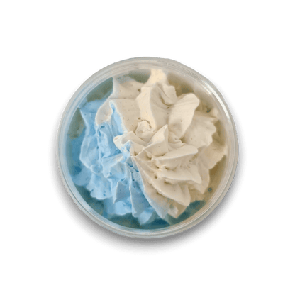 Seychelles Whipped Soap in a round container with a dual swirl of creamy blue and white whipped butter texture
