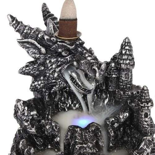 Silver Dragon Backflow Incense Burner with waterfall effect and glowing light.