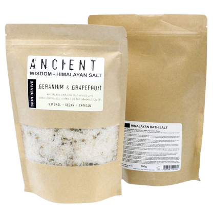 Skin Revive Himalayan Bath Salt in kraft pouches with coarse mineral salt, botanicals, and Geranium & Grapefruit label