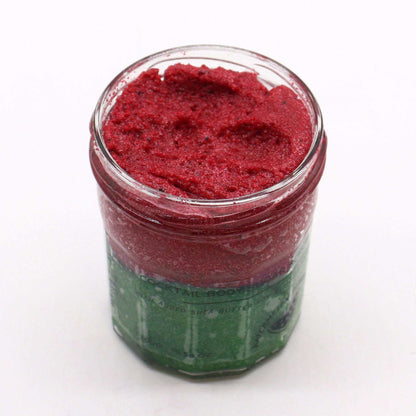 Sugar Body Scrub - Watermelon Daquiri in a clear jar with vibrant red and green layers of fragranced exfoliating scrub