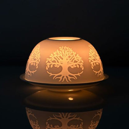 Tree of Life Dome Tealight Holder with intricate design illuminating in the dark.